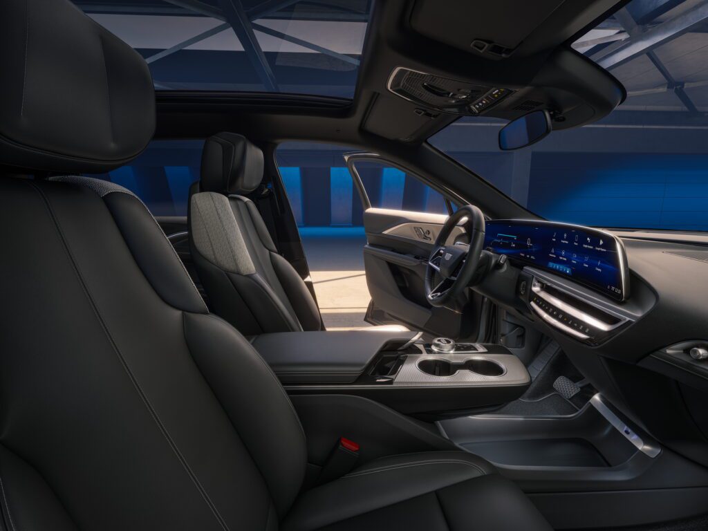 Interior shot of the full dash and center console in the 2024 Cadillac LYRIQ Tech trim.