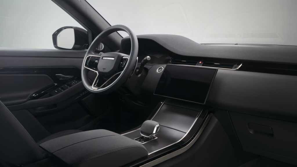 Interiores del Range Rover Evoque 2024: Un santuario de calma y lujo, equipado con tecnología avanzada y materiales de primera calidad.