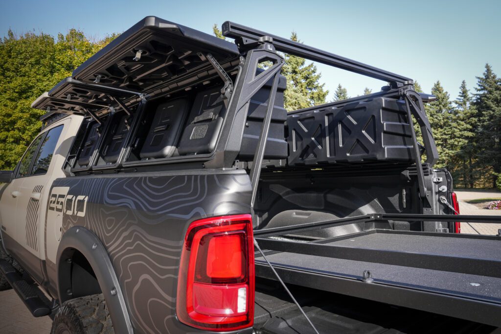Fitted above the truck bed of the Ram 2500 Power Wagon Concept, an active cargo-rack storage system from Leitner Designs carries up to eight durable GearPODS that are integrated along the top of the bed sides. The versatile system adds valuable storage without sacrificing truck bed floor space. Also helping to manage cargo is a drop-in Bed Slide system - making loading and unloading gear an effortless task.