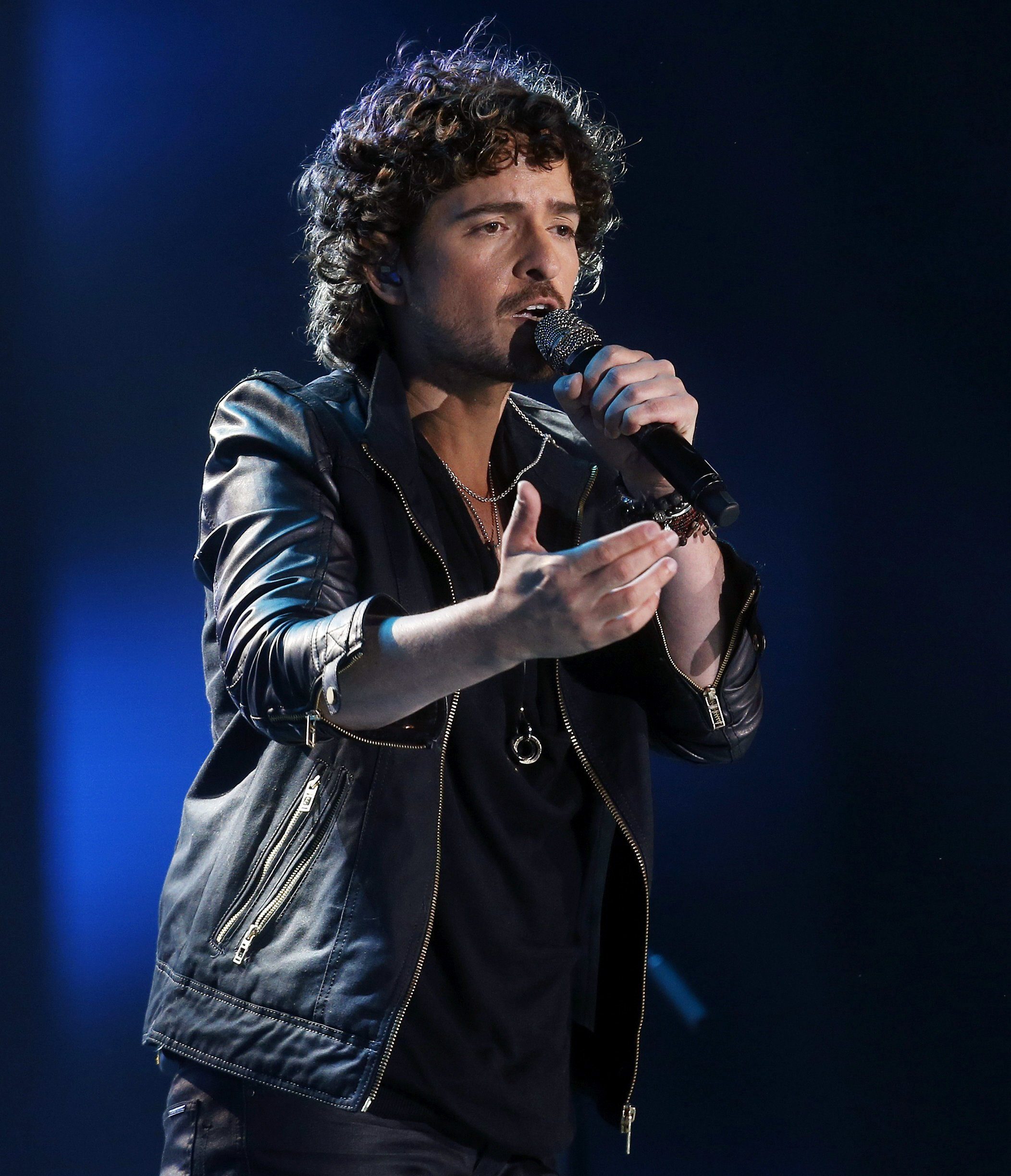 Puerto Rican singer Tommy Torres performs during the last day of the International Festival of Vina del Mar, 120 km from Santiago de Chile, Chile, 28 February 2014. The festival was held between 23 and 28 February. EFE/Felipe Trueba